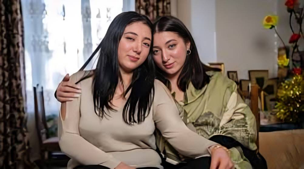 Social media chance encounter reunites identical twins separated at birth